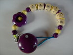 Pacifier chain with name of Gisi's flower